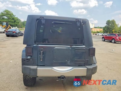 Zdjęcie 6 z 12 samochodu: 2007 JEEP WRANGLER SAHARA VIN:1J4GB59177L199570 - miniatura