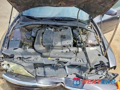Zdjęcie 11 z 13 samochodu: 2002 LINCOLN LS VIN:1LNHM87A12Y607514 - miniatura