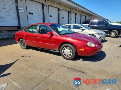 Czwarte zdjęcie samochodu z boku: 1996 FORD TAURUS GL VIN:1FALP52U2TG241369 - miniatura
