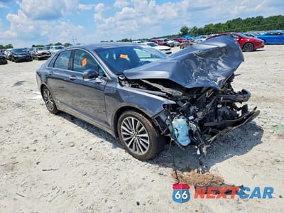 Czwarte zdjęcie samochodu z boku: 2018 LINCOLN MKZ PREMIERE VIN:3LN6L5A96JR610042 - miniatura
