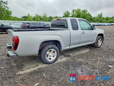 Trzecie zdjęcie samochodu z tyłu: 2011 GMC CANYON SLE VIN:1GTE5MFE1B8125210 - miniatura