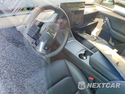 Zdjęcie 8 z 12 samochodu: 2023 TESLA MODEL Y VIN:7SAYGDEE7PA052182 - miniatura