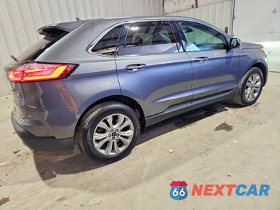 Trzecie zdjęcie samochodu z tyłu: 2023 FORD EDGE TITANIUM VIN:2FMPK4K92PBA60006 - miniatura