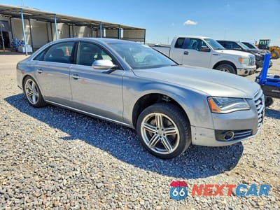 Czwarte zdjęcie samochodu z boku: 2013 AUDI A8 L QUATTRO VIN:WAURGAFD0DN019947 - miniatura