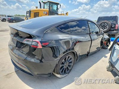 Trzecie zdjęcie samochodu z tyłu: 2023 TESLA MODEL Y VIN:7SAYGAEE8PF832113 - miniatura