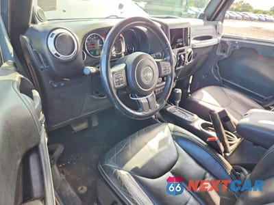 Zdjęcie 8 z 12 samochodu: 2014 JEEP WRANGLER UNLIMITED RUBICON VIN:1C4BJWFG0EL297144 - miniatura