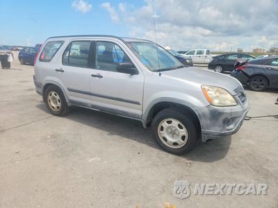 Czwarte zdjęcie samochodu z boku: 2006 HONDA CR-V LX VIN:JHLRD68586C002975 - miniatura