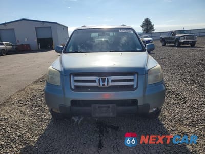 Piąte zdjęcie samochodu w środku: 2006 HONDA PILOT EX VIN:2HKYF18536H547640 - miniatura