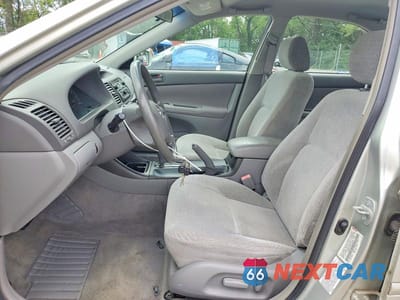 Zdjęcie 7 z 12 samochodu: 2003 TOYOTA CAMRY LE VIN:JTDBE32K230169676 - miniatura