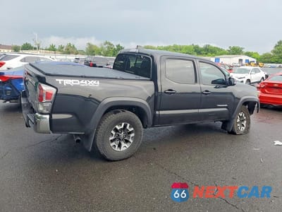 Trzecie zdjęcie samochodu z tyłu: 2023 TOYOTA TACOMA TRD OFF-ROAD VIN:3TMCZ5AN9PM648969 - miniatura