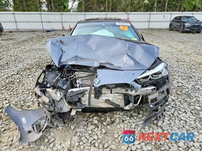 Piąte zdjęcie samochodu w środku: 2021 BMW 228XI VIN:WBA73AK06M7H42277 - miniatura