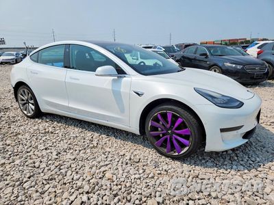 Czwarte zdjęcie samochodu z boku: 2018 TESLA MODEL 3 VIN:5YJ3E1EB3JF117766 - miniatura