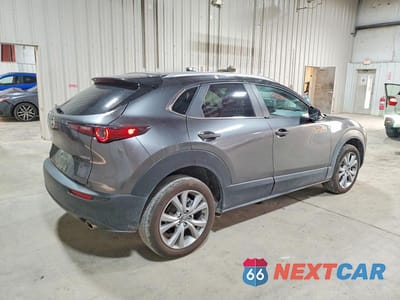 Trzecie zdjęcie samochodu z tyłu: 2023 MAZDA CX-30 PREFERRED VIN:3MVDMBCM6PM518667 - miniatura