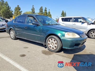 Czwarte zdjęcie samochodu z boku: 1999 HONDA CIVIC LX VIN:2HGEJ6673XH558832 - miniatura