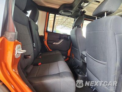 Zdjęcie 10 z 12 samochodu: 2011 JEEP WRANGLER UNLIMITED SPORT VIN:1J4HA3H14BL586051 - miniatura