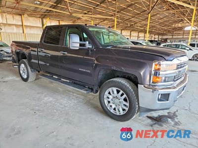 Czwarte zdjęcie samochodu z boku: 2015 CHEVROLET SILVERADO VIN:1GC1KVE87FF124248 - miniatura