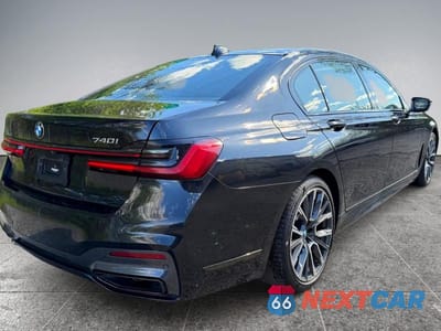 Czwarte zdjęcie samochodu z boku: 2022 BMW 740 XI VIN:WBA7T4C03NCK23662 - miniatura