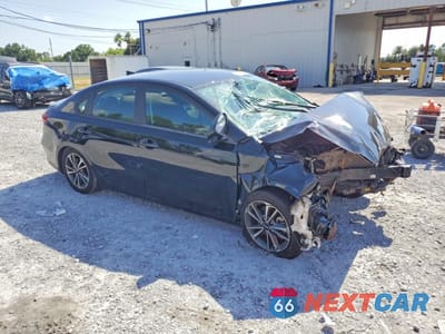 Czwarte zdjęcie samochodu z boku: 2023 KIA FORTE LXS VIN:3KPF24AD5PE671744 - miniatura