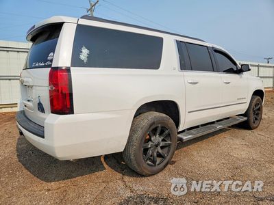 Trzecie zdjęcie samochodu z tyłu: 2019 CHEVROLET SUBURBAN K1500 LT VIN:1GNSKHKC4KR217064 - miniatura