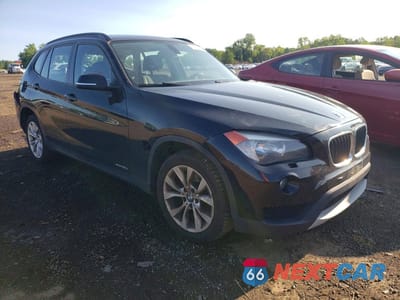 Czwarte zdjęcie samochodu z boku: 2014 BMW X1 XDRIVE28I VIN:WBAVL1C5XEVY20166 - miniatura