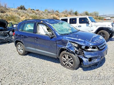 Czwarte zdjęcie samochodu z boku: 2016 VOLKSWAGEN TIGUAN S VIN:WVGAV7AX2GW562169 - miniatura