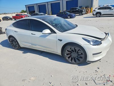Czwarte zdjęcie samochodu z boku: 2023 TESLA MODEL 3 VIN:5YJ3E1EC1PF605583 - miniatura
