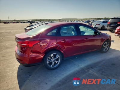 Trzecie zdjęcie samochodu z tyłu: 2016 FORD FOCUS SE VIN:1FADP3FE0GL225096 - miniatura