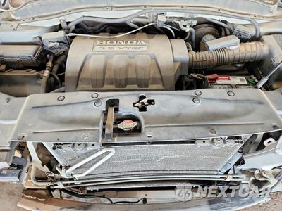 Zdjęcie 12 z 13 samochodu: 2006 HONDA PILOT EX VIN:2HKYF18626H526870 - miniatura