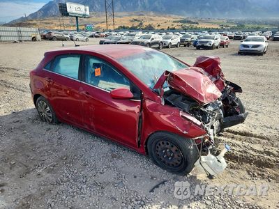 Czwarte zdjęcie samochodu z boku: 2016 HYUNDAI ELANTRA GT BASE VIN:KMHD35LH1GU286091 - miniatura