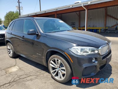 Czwarte zdjęcie samochodu z boku: 2018 BMW X5 XDR40E VIN:5UXKT0C59J0W00068 - miniatura