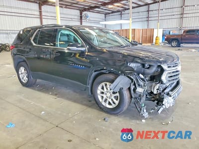 Czwarte zdjęcie samochodu z boku: 2021 CHEVROLET TRAVERSE LT VIN:1GNERHKW4MJ213746 - miniatura