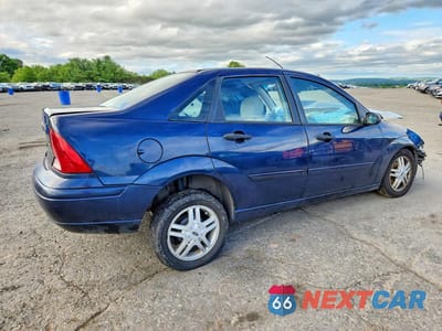 Trzecie zdjęcie samochodu z tyłu: 2003 FORD FOCUS SE COMFORT VIN:1FAFP34Z03W307188 - miniatura