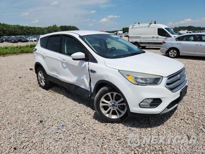 Czwarte zdjęcie samochodu z boku: 2017 FORD ESCAPE SE VIN:1FMCU9GD3HUC31134 - miniatura