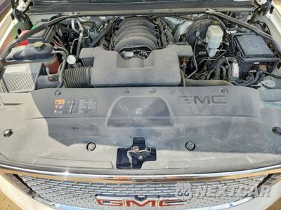 Zdjęcie 12 z 13 samochodu: 2015 GMC YUKON DENALI VIN:1GKS2CKJ4FR582736 - miniatura
