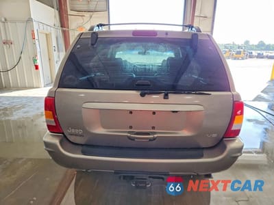 Zdjęcie 6 z 12 samochodu: 1999 JEEP GRAND CHEROKEE LIMITED VIN:1J4GW68N4XC689107 - miniatura