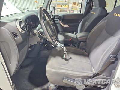 Zdjęcie 7 z 13 samochodu: 2013 JEEP WRANGLER UNLIMITED SAHARA VIN:1C4BJWEG7DL599465 - miniatura