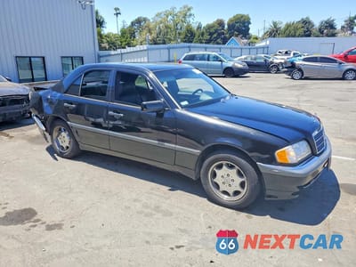 Czwarte zdjęcie samochodu z boku: 1998 MERCEDES-BENZ C 230 VIN:WDBHA23G3WA602655 - miniatura