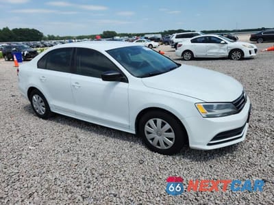 Czwarte zdjęcie samochodu z boku: 2015 VOLKSWAGEN JETTA BASE VIN:3VW2K7AJ2FM402513 - miniatura