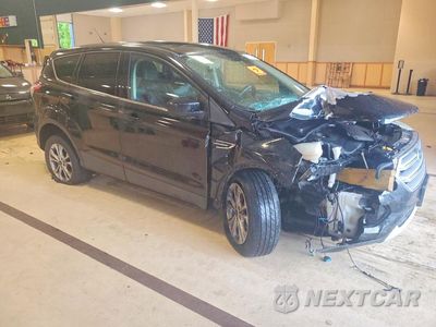 Czwarte zdjęcie samochodu z boku: 2017 FORD ESCAPE SE VIN:1FMCU9G96HUC52958 - miniatura