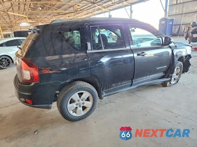 Trzecie zdjęcie samochodu z tyłu: 2014 JEEP COMPASS VIN:1C4NJCBA0ED573832 - miniatura