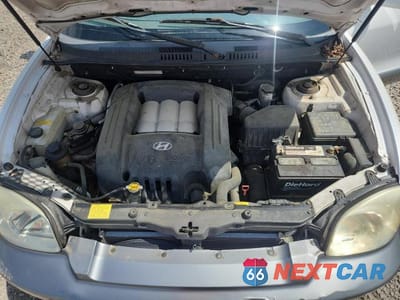 Zdjęcie 12 z 13 samochodu: 2004 HYUNDAI SANTA FE GLS VIN:KM8SC13D74U699528 - miniatura