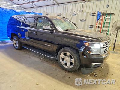 Czwarte zdjęcie samochodu z boku: 2017 CHEVROLET SUBURBAN C1500 PREMIER VIN:1GNSCJKC6HR344802 - miniatura