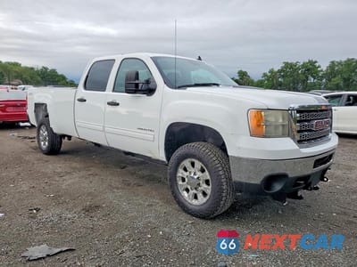 Czwarte zdjęcie samochodu z boku: 2014 GMC SIERRA K3500 SLE VIN:1GT423EGXEF130035 - miniatura