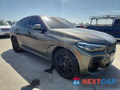 Czwarte zdjęcie samochodu z boku: 2023 BMW X6 XDRIVE40I VIN:5UXCY6C05P9P34612 - miniatura