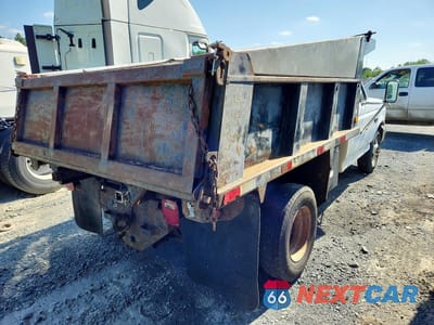 Trzecie zdjęcie samochodu z tyłu: 1995 FORD F350 SUPER DUTY DUMP TRUCK VIN:1FDJF37G4SEA06893 - miniatura