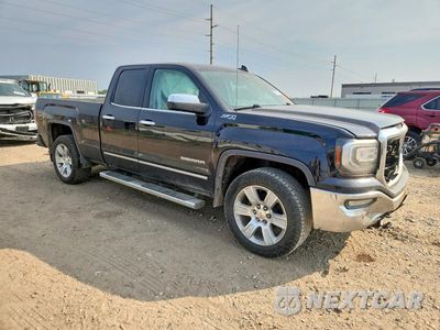 Czwarte zdjęcie samochodu z boku: 2016 GMC SIERRA K1500 SLT VIN:1GTV2NEC4GZ230274 - miniatura