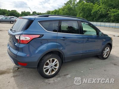 Trzecie zdjęcie samochodu z tyłu: 2018 FORD ESCAPE SE VIN:1FMCU9GDXJUC46087 - miniatura