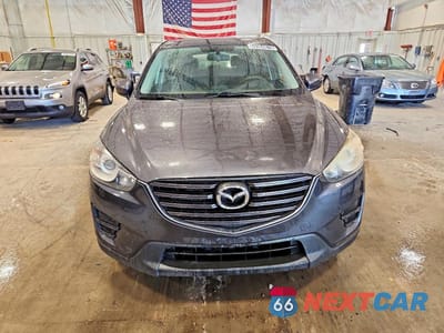 Piąte zdjęcie samochodu w środku: 2016 MAZDA CX-5 SPORT VIN:JM3KE2BYXG0629422 - miniatura