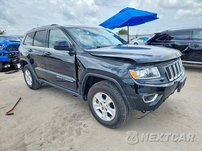 Czwarte zdjęcie samochodu z boku: 2014 JEEP GRAND CHEROKEE LAREDO VIN:1C4RJFAG1EC119877 - miniatura