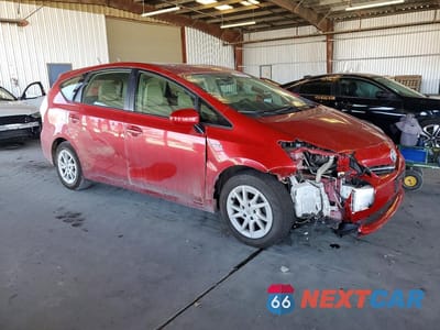 Czwarte zdjęcie samochodu z boku: 2012 TOYOTA PRIUS V THREE VIN:JTDZN3EU1C3186334 - miniatura